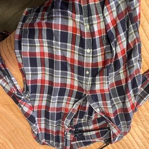 Nice button up shirt in good condition does have a little white spot as seen in
